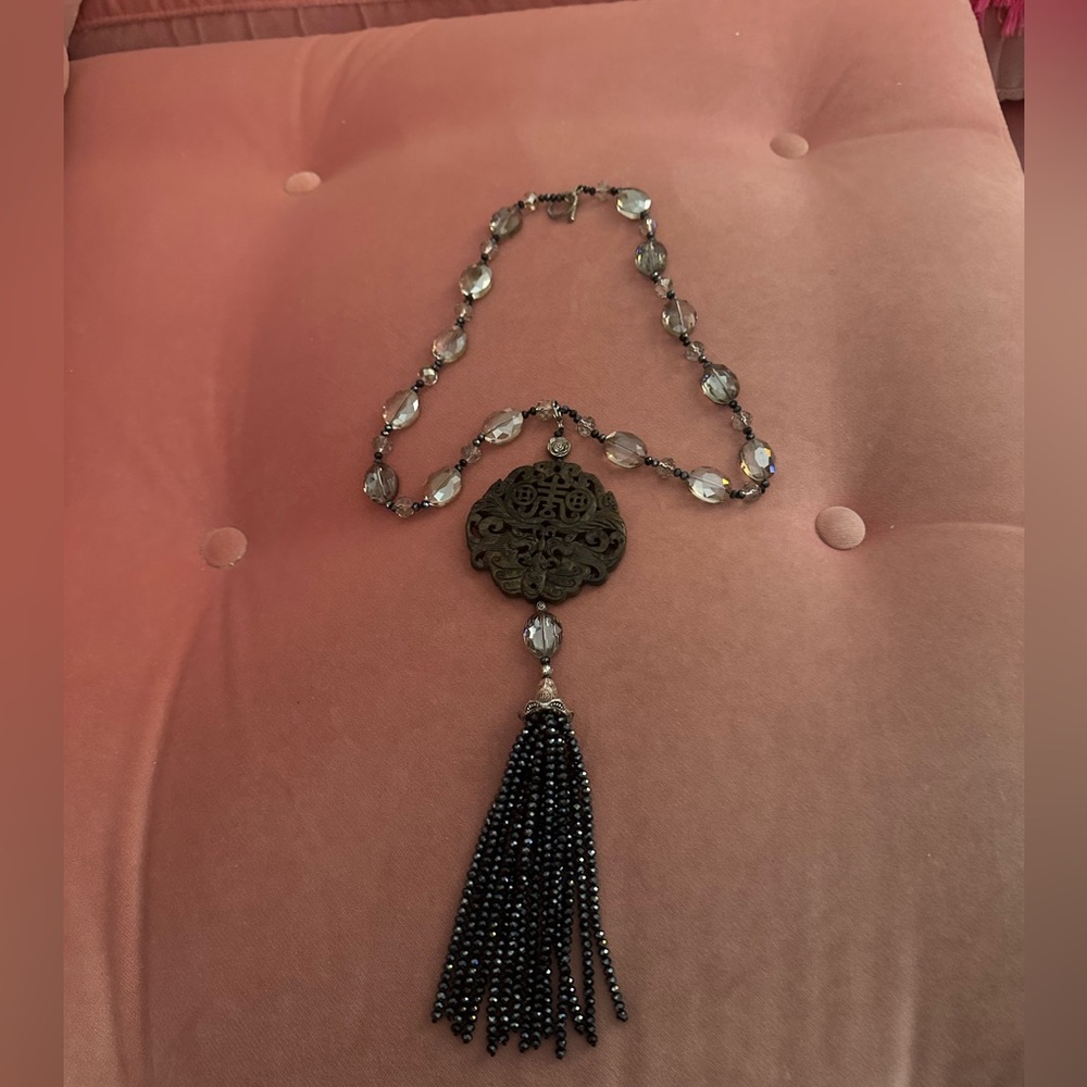 Elegant Crystal Beaded Necklace with Carved Ceramic Pendant and tassel